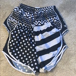 2 Varsity black and white cheer/running shorts